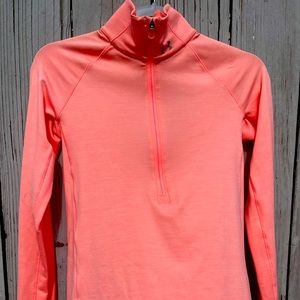 Light pink sports turtleneck sweater for women from under armour